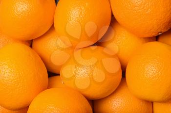 Heap of fresh oranges, closeup�