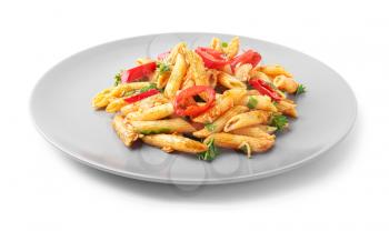 Plate with tasty pasta on white background�