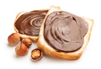 Fresh bread with chocolate paste on white background�