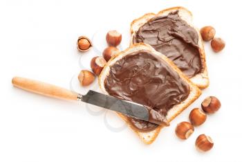 Fresh bread with chocolate paste on white background�