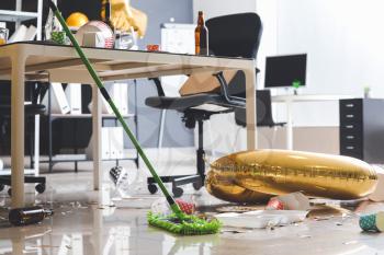 Cleaning of floor in office after New Year party�