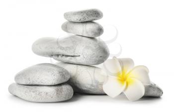 Spa stones and flower on white background�