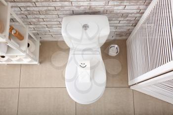 Interior of bathroom with toilet bowl, top view�