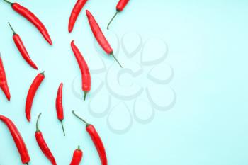 Hot chili pepper on color background�