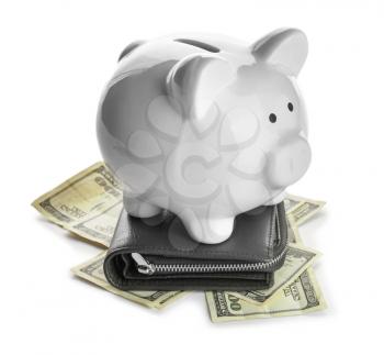 Piggy bank with money and wallet on white background�
