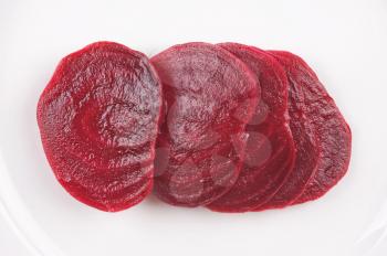 sliced boiled beetroot on a white plate