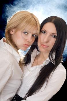 Royalty Free Photo of a Blonde and a Brunette