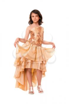 Lovely little girl in a chic evening dress. Isolated