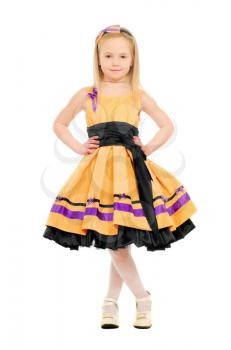 Adorable little girl in a yellow dress. Isolated