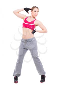 Sexy sporty blond woman doing exercises. Isolated on white;
