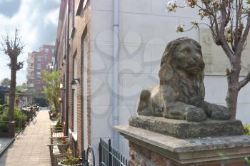 A statue of a lion near a house in Gorinchem. Netherlands