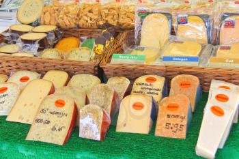 DORDRECHT, THE NETHERLANDS - SEPTEMBER 28: Cheese on sale in the market in the festive city on September 28, 2013 in Dordrecht, Netherlands 