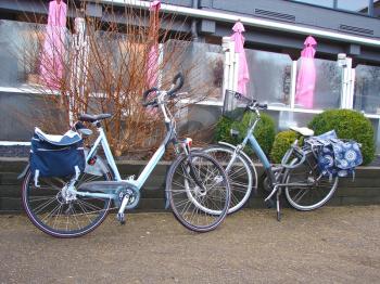 Two bicycles near the outdoor cafes. Netherlands