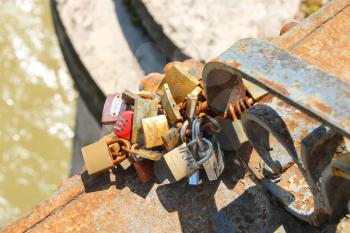 ROME, ITALY - MAY 03, 2014: Love locks on the bridge across the Tiber in Rome, Italy