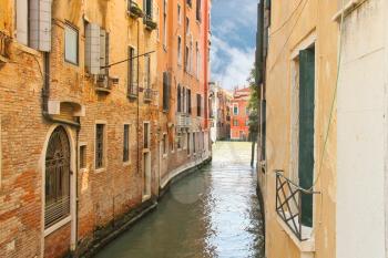 House on a narrow canal in Venice, Italy