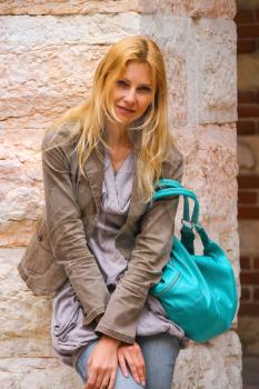 Attractive girl in courtyard  the Palazzo della Ragione in Verona, Italy