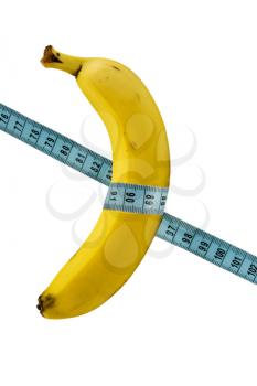 Royalty Free Photo of a Banana Wrapped in Measuring Tape