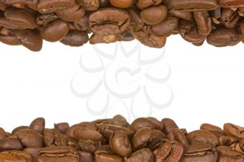 Two lines of roasted coffee beans, isolated on white background