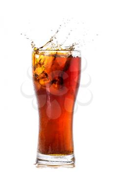 Cola glass with ice cubes over white background