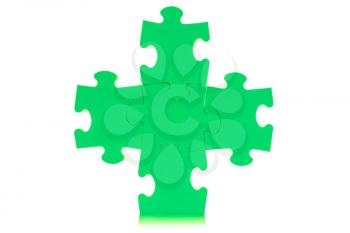 Five attached green puzzles, isolated over white background