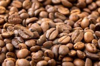 Brown roasted coffee beans. Espresso dark, aroma, black caffeine drink. 
