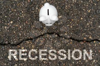 Concept financial recession, economic depression, crash financial. Piggy bank standing near the crack in asphalt