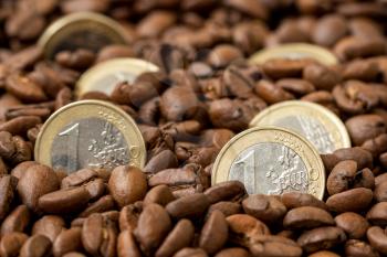 Europe coffee market. Roasted coffee beans and Euro currency