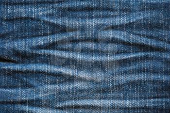Dark blue jeans background. Close up blue jeans texture.