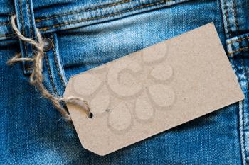 Blue jeans detail with blank tag