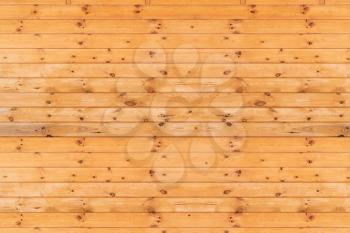 Wooden planks on wall. Wooden wall of ecological house