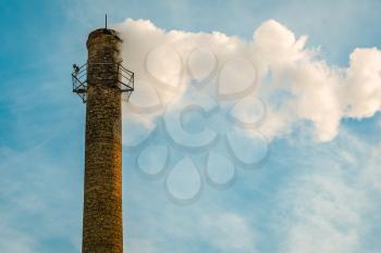 Factory chimney and smoke polluting environment and ecology of planet Earth