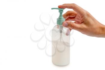 Hand using hand sanitizer gel pump dispenser. Copy space.