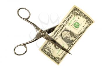 Cutting one dollar with scissors, isolated on white background