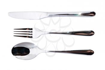 Spoon, fork and knife over white background