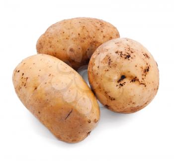 Three ripe potatoes  isolated on white background
