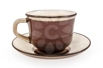 Coffee in a brown cup and saucer from the side isolated on white background