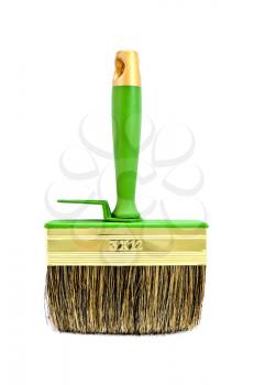 A large brush to paint with a green handle isolated on white background