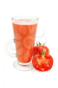 Tomato juice in a tall glass with the whole and sliced tomato isolated on white background
