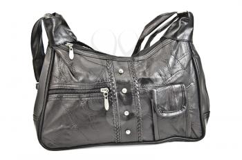 Soft black leatherette bag with detachable locks, pocket and rivets isolated on a white background