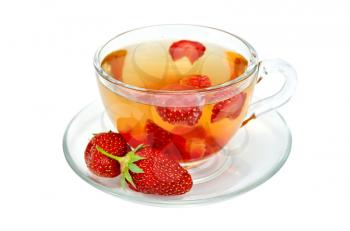 Tea with strawberries in a glass cup isolated on white background