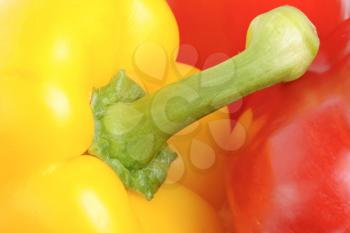 Royalty Free Photo of a Yellow and Red Pepper Closeup