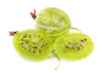 Whole and sliced green gooseberry fruit closeup with seed on white background 

