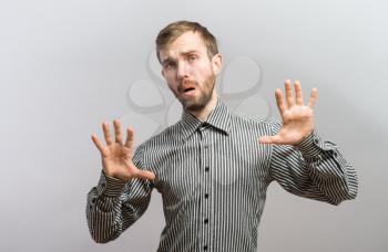 man with showing calming down sign - isolated