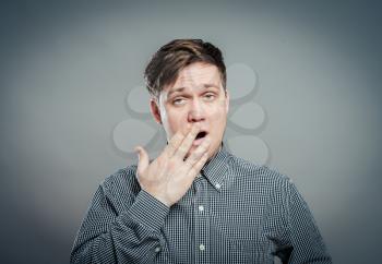 Portrait of surprised young man 