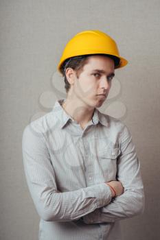 young man in a construction helmet