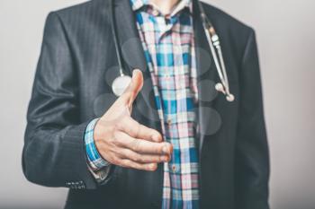 bearded man greets hand