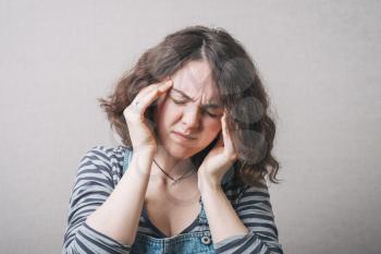 Headache.  woman having a headache