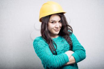 portrait of a girl in the construction helmet