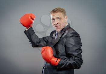 businessman in boxing gloves isolated 