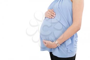 Image of pregnant woman touching her belly with hands isolated on white background 